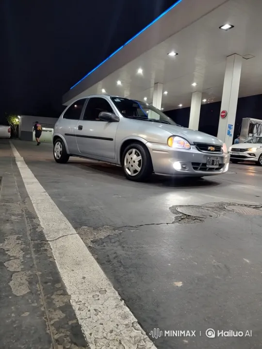 Silver Hatchback Lowering at Night Gas Station – AI Generated Video | Hailuo AI