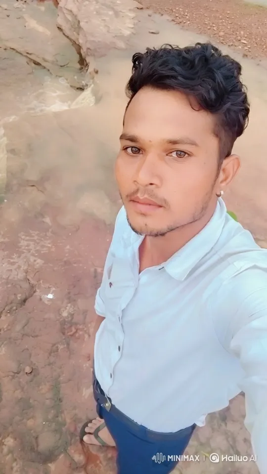 Young Man Observes Calmly Amidst Water and Wind – AI Generated Video | Hailuo AI
