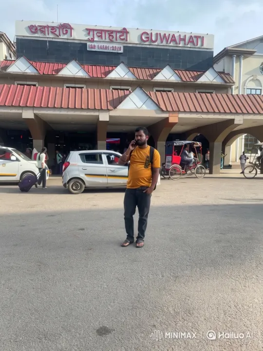 Man on Phone at Guwahati Train Station – AI Generated Video | Hailuo AI