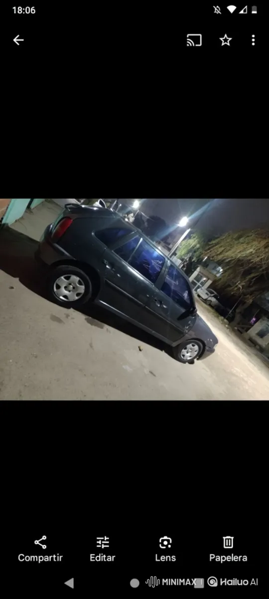 Custom Hatchback Lowers Smoothly on Night Street – AI Generated Video | Hailuo AI