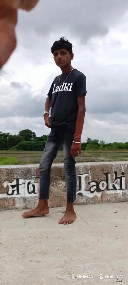 Young Boy Poses with Confidence Under Cloudy Sky – AI Generated Video | Hailuo AI