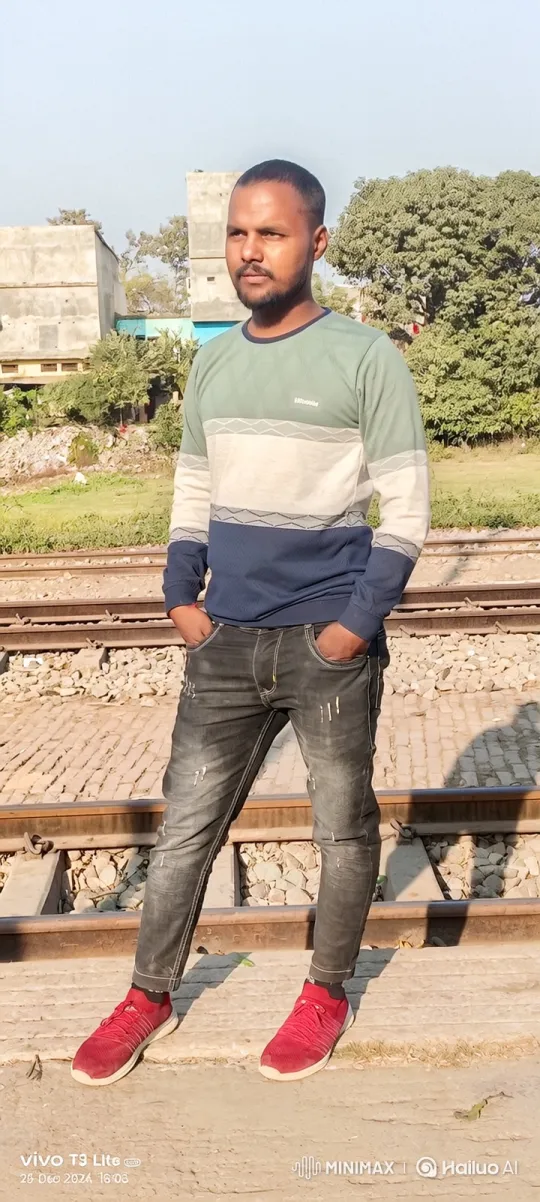 Man in Thoughtful Stance on Train Track Platform – AI Generated Video | Hailuo AI