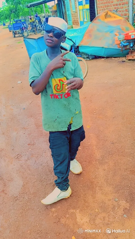 Young Man Poses Confidently on Dirt Road – AI Generated Video | Hailuo AI