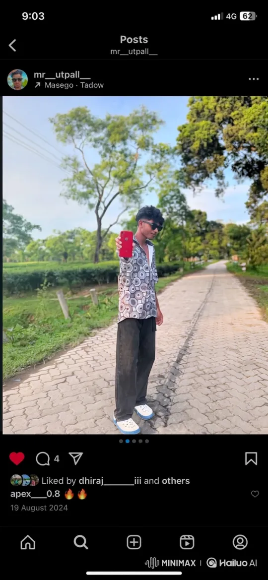Stylish Man Poses on Lush Path with Smartphone – AI Generated Video | Hailuo AI
