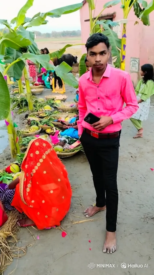 Young Man in Pink Shirt Amidst Traditional Gathering – AI Generated Video | Hailuo AI
