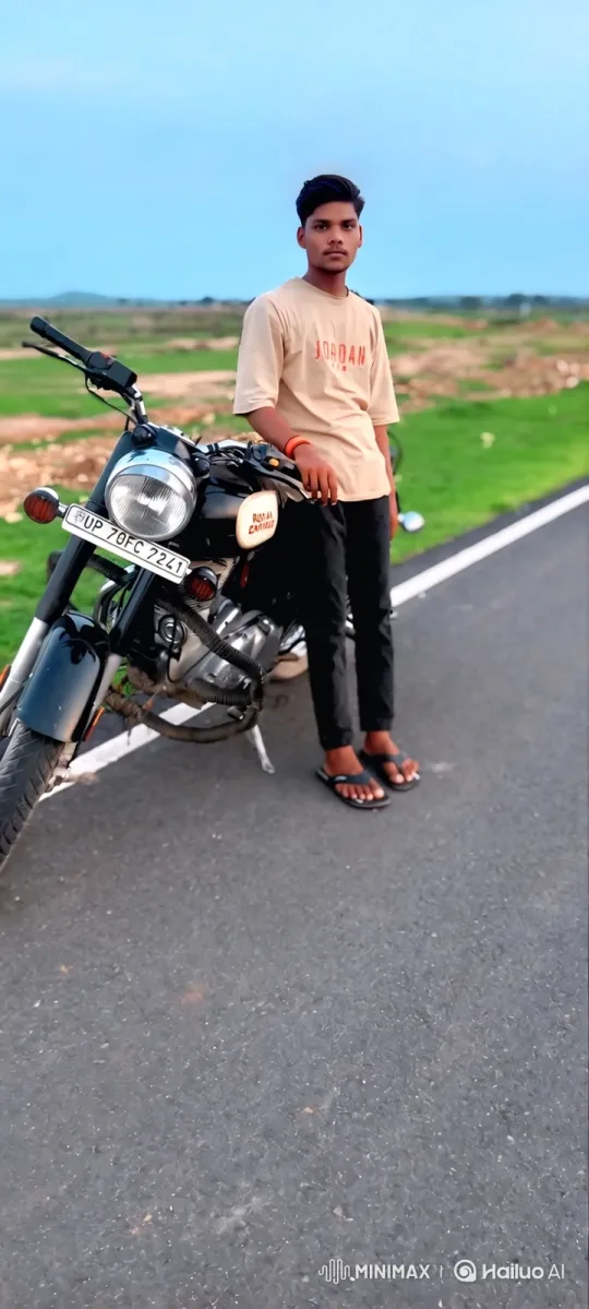 Young Man Reflects Beside Motorcycle on Countryside Road – AI Generated Video | Hailuo AI
