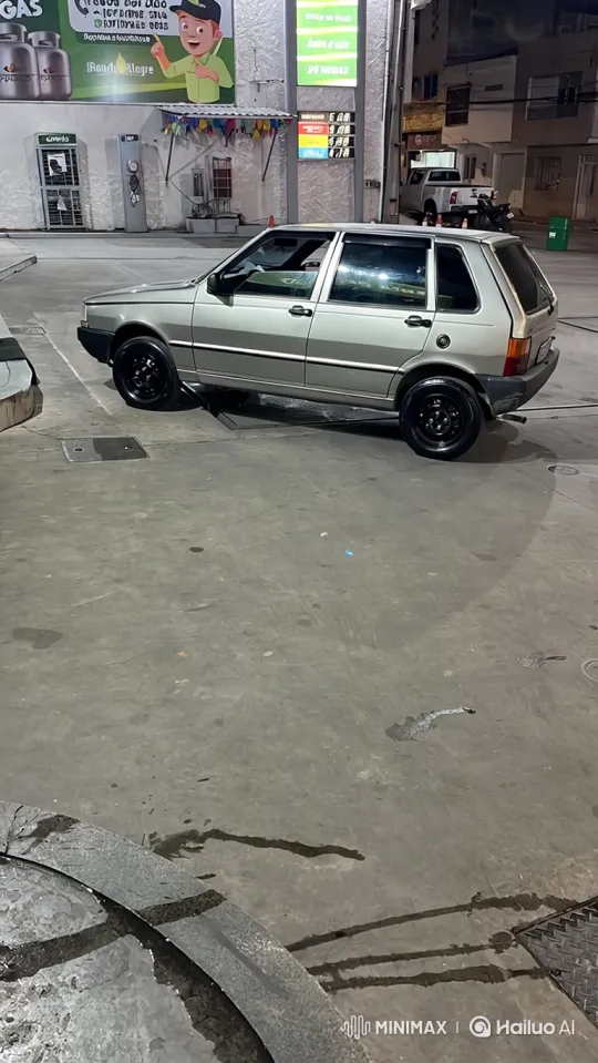 Silver Hatchback Lowers Its Suspension at Night – AI Generated Video | Hailuo AI