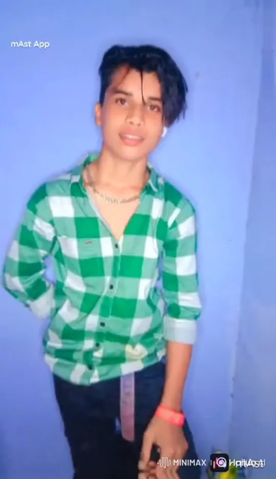 Young Man with Pink Wristband and Gentle Smile – AI Generated Video | Hailuo AI