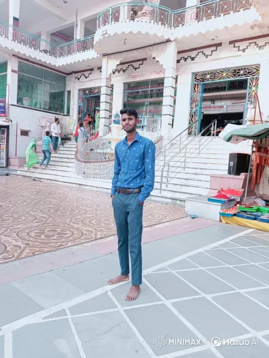 Young Man in Courtyard with Calm Smile – AI Generated Video | Hailuo AI