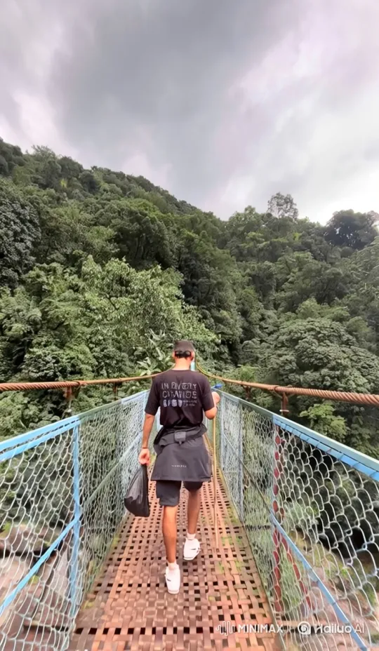 Man Walks Bridge, Camera Zooms Out to Space – AI Generated Video | Hailuo AI