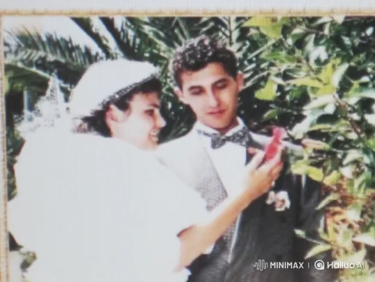 Vintage Couple Examines Object in Intimate Moment – AI Generated Video | Hailuo AI