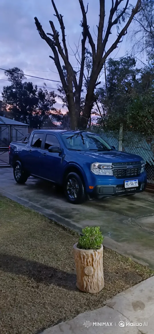 Blue Truck Backing Up in Twilight Residential Yard – AI Generated Video | Hailuo AI