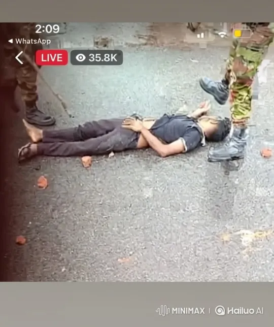 Soldier Kicks Man Lying on Street in Violent Confrontation – AI Generated Video | Hailuo AI