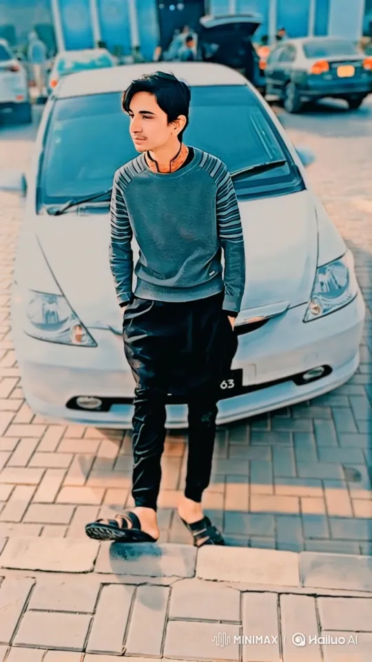 Young Man in Pensive Pose, Gradually Engages Camera – AI Generated Video | Hailuo AI
