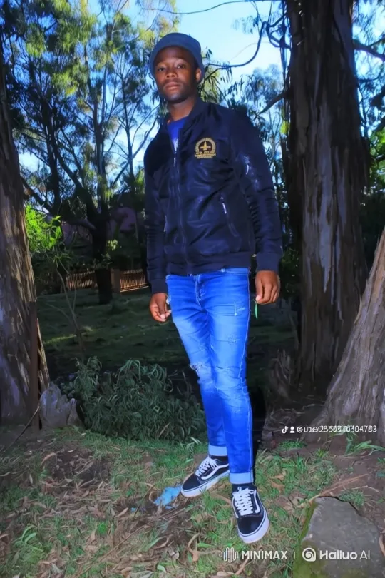 Young Man Walks Through Woods, Camera Tracks Movement – AI Generated Video | Hailuo AI