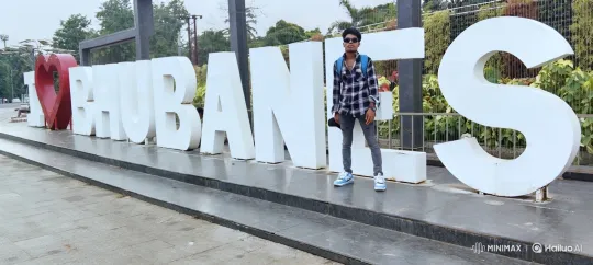 Young Man in Plaid Boards Luxury Car in Bhubaneswar – AI Generated Video | Hailuo AI