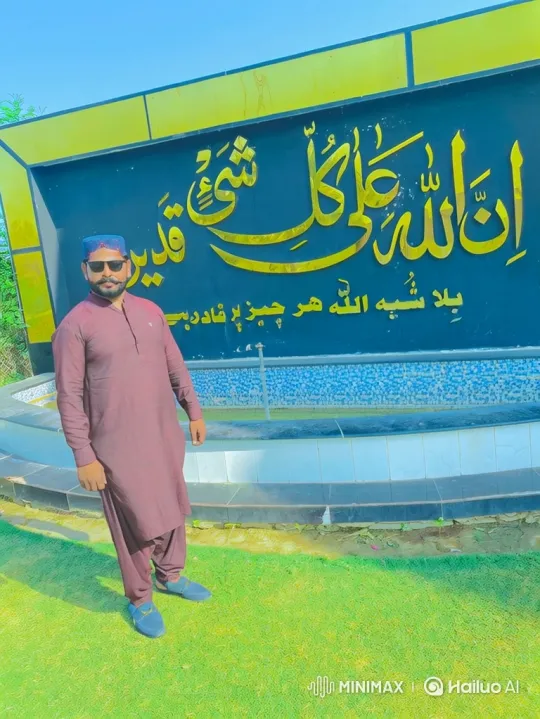 Man in Maroon Tunic Stands by Monument, Gazes Calmly – AI Generated Video | Hailuo AI