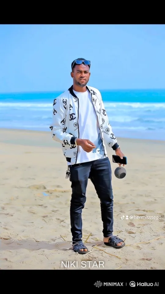 Young Man Prepares for Departure on Sandy Beach – AI Generated Video | Hailuo AI