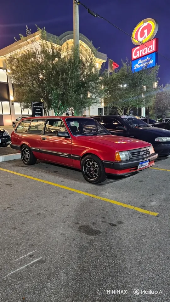Red Station Wagon Lowering Its Body at Night – AI Generated Video | Hailuo AI