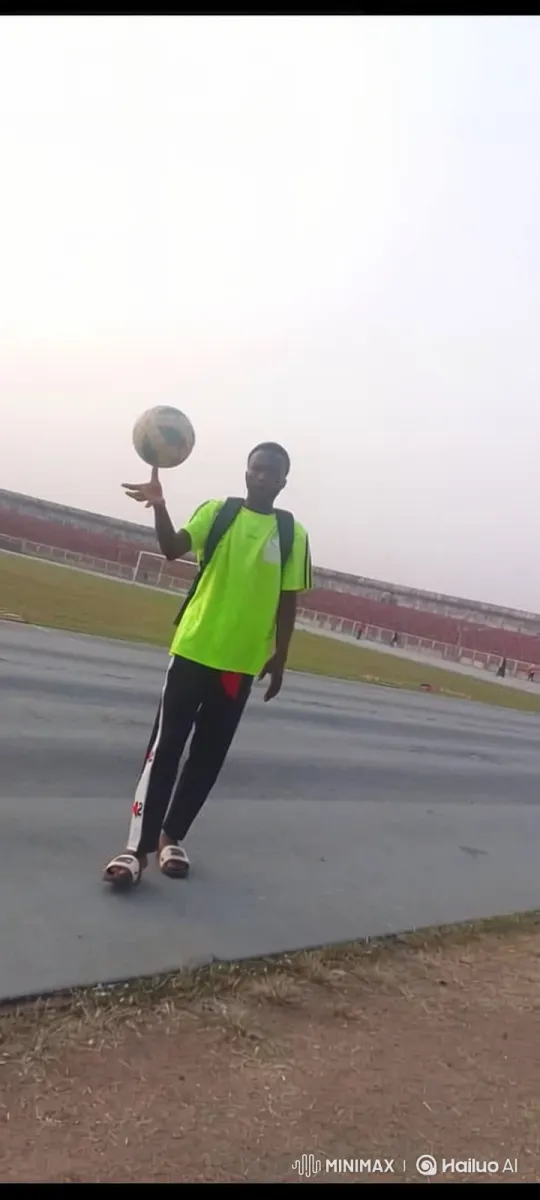 Young Man Balances Soccer Ball, Heads to Car – AI Generated Video | Hailuo AI