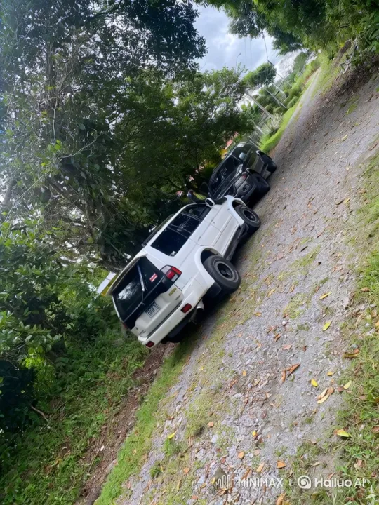 Two SUVs Descend Sloping Gravel Road – AI Generated Video | Hailuo AI