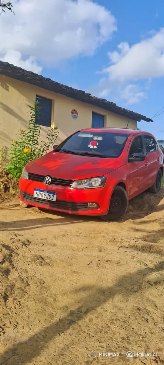 Red Hatchback Lowers Suspension on Sandy Terrain – AI Generated Video | Hailuo AI