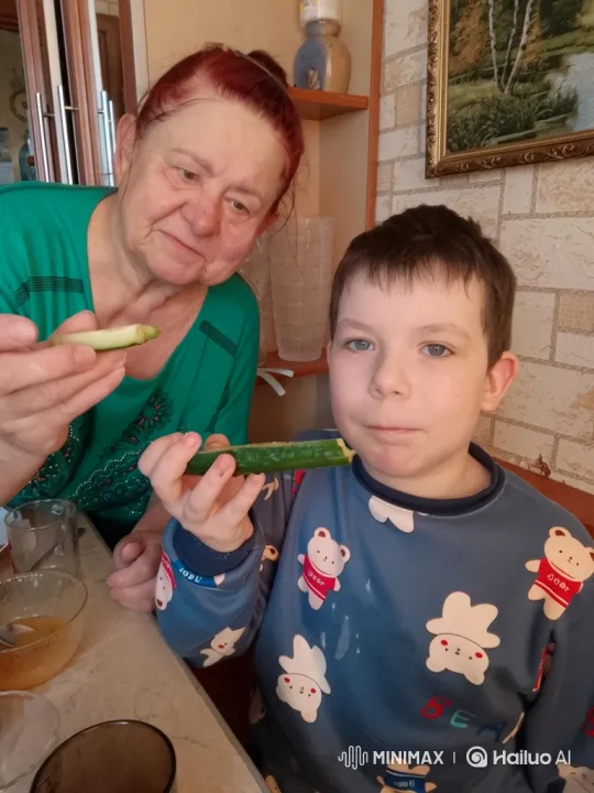 Boy and Grandmother Share Cucumber and Dance – AI Generated Video | Hailuo AI