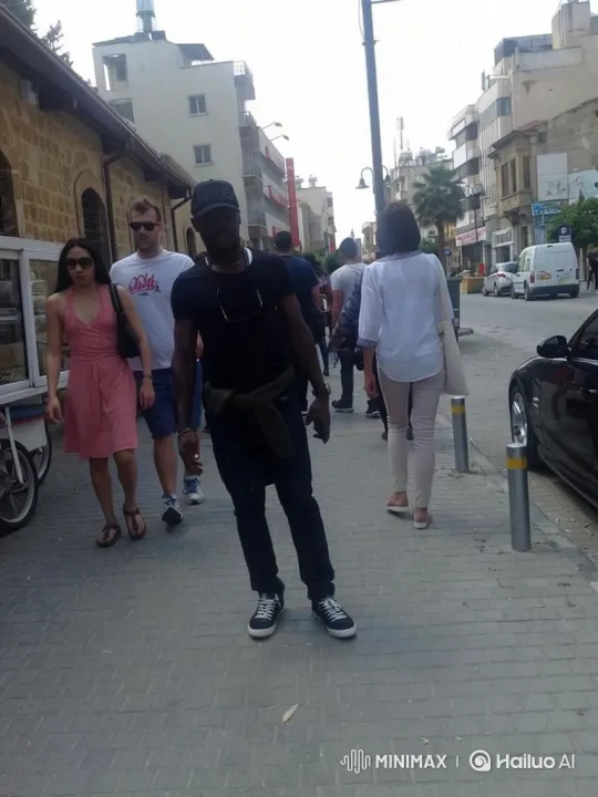 Urban Sidewalk Scene with Pedestrians Walking Away – AI Generated Video | Hailuo AI