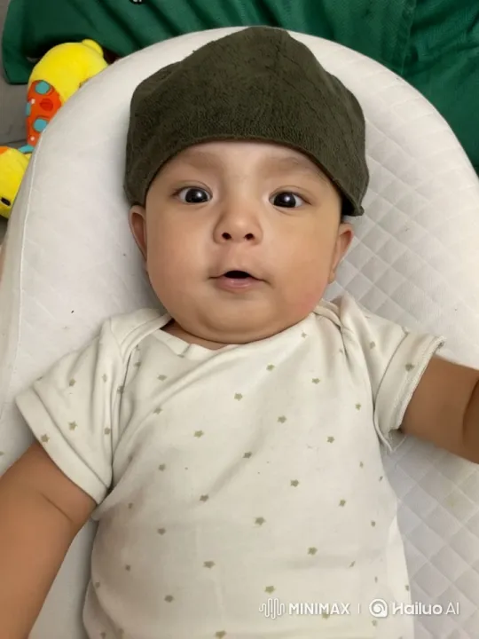 Innocent Baby Curiously Explores Playful Box Contents – AI Generated Video | Hailuo AI