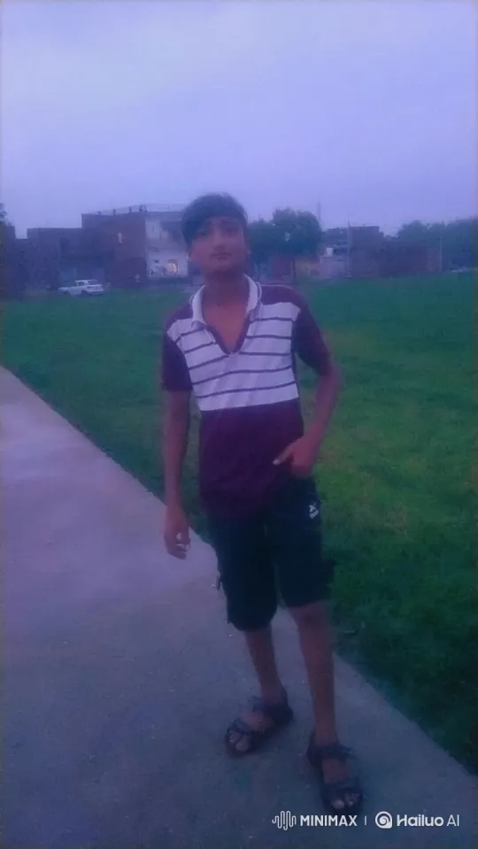 Young Man Smiles Gently in Twilight Scene – AI Generated Video | Hailuo AI