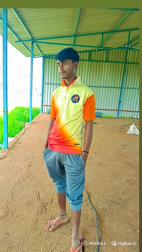Young Man in Casual Attire Smiles Gently at Camera – AI Generated Video | Hailuo AI