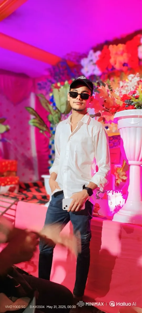 Young Man in Vibrant Setting with Cool Pose – AI Generated Video | Hailuo AI