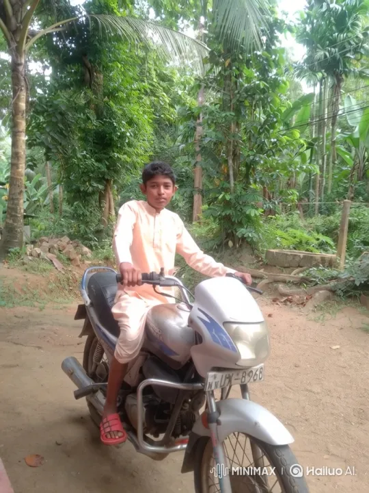 Young Boy Embraces Confidence on Motorcycle in Tropical Forest – AI Generated Video | Hailuo AI