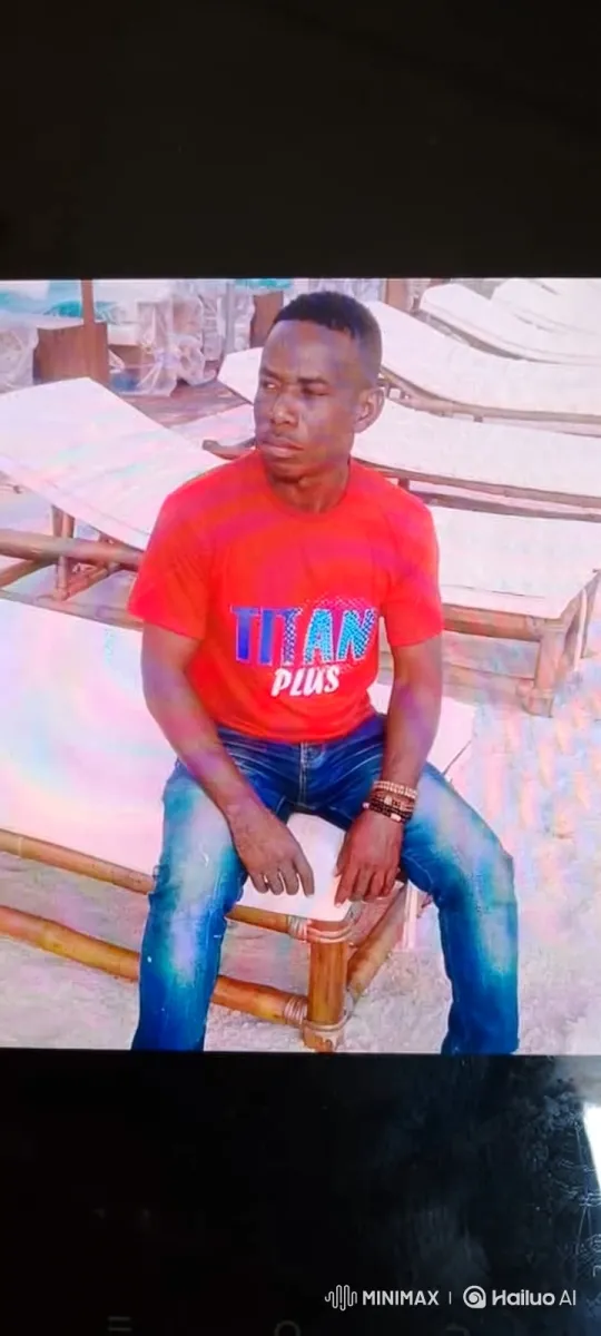 Young Man in Red Shirt Smiles at Camera – AI Generated Video | Hailuo AI