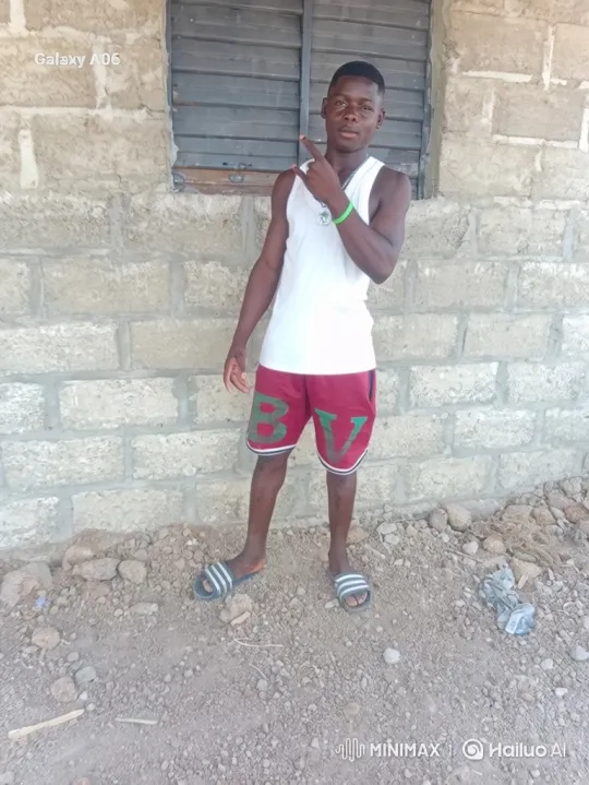 Young Black Man in Casual Attire Performs Hand Gesture – AI Generated Video | Hailuo AI