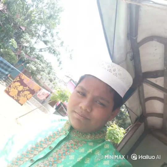 Boy in Green Tunic Amidst Nature on Sunny Day – AI Generated Video | Hailuo AI