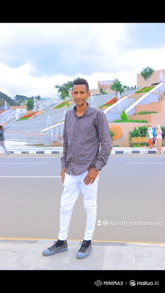 Young Man on Sidewalk Amidst Bustling Plaza – AI Generated Video | Hailuo AI