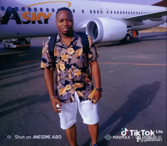Man Dancing Cheerfully on Airport Tarmac – AI Generated Video | Hailuo AI