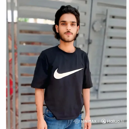 Young Man in Calm Stance Amidst Gentle Breeze – AI Generated Video | Hailuo AI