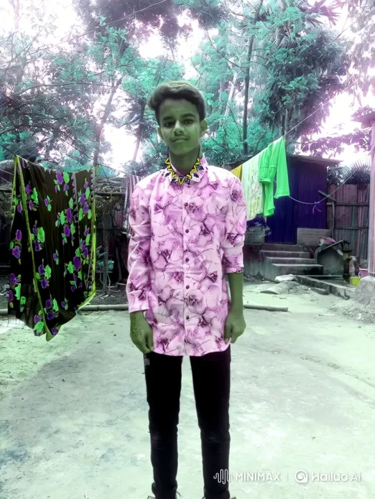 Young Man in Floral Shirt Stands Still in Yard – AI Generated Video | Hailuo AI