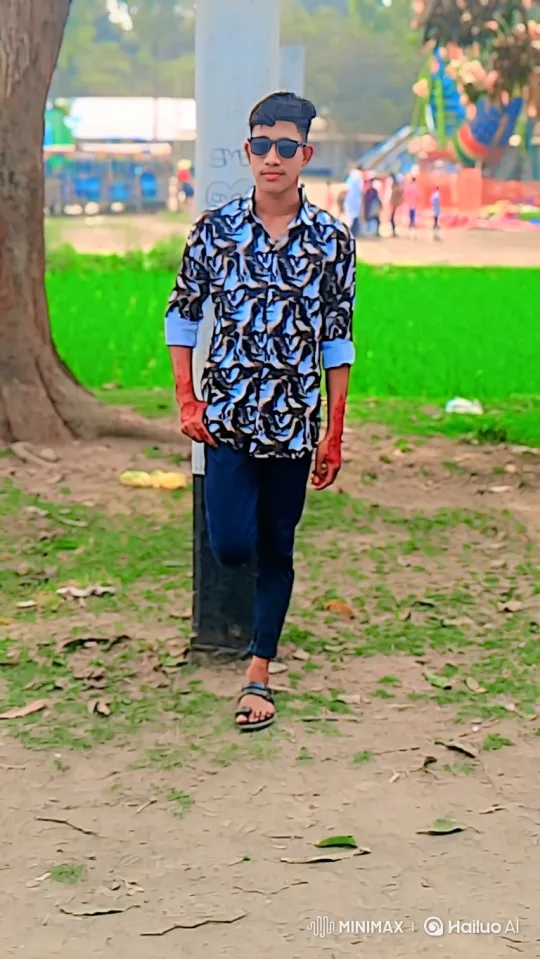 Young Man in Park with Passing Car Scene – AI Generated Video | Hailuo AI