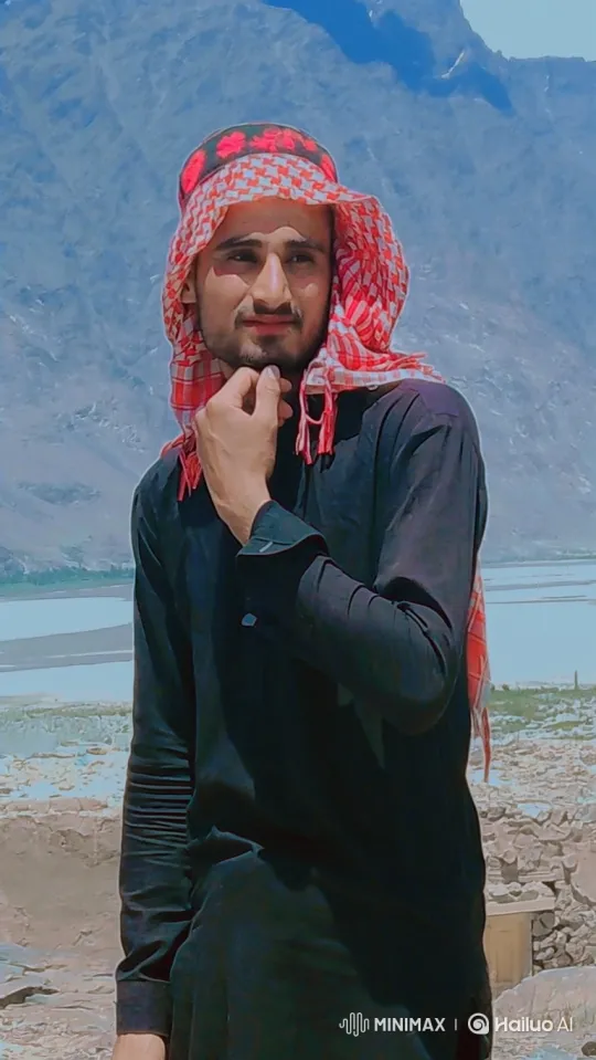Young Man Contemplates Vast Mountainside – AI Generated Video | Hailuo AI