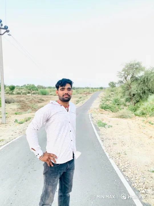 Man Stands Confidently on Rural Road Amidst Gentle Breeze – AI Generated Video | Hailuo AI