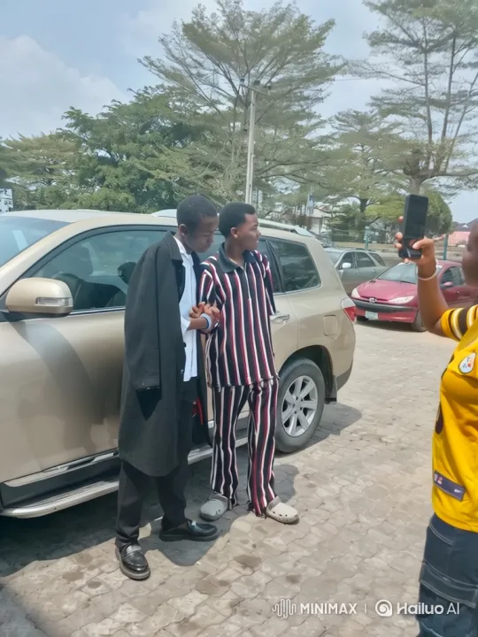 Friends take photos for memories, red Ferrari surprises appearance – AI Generated Video | Hailuo AI