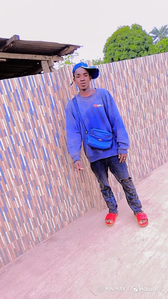 Young Man Poses Casually in Colorful Outfit – AI Generated Video | Hailuo AI