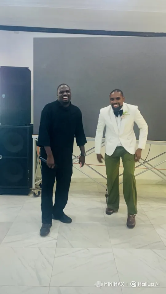 Two Men Celebrate Dancing in a Room – AI Generated Video | Hailuo AI