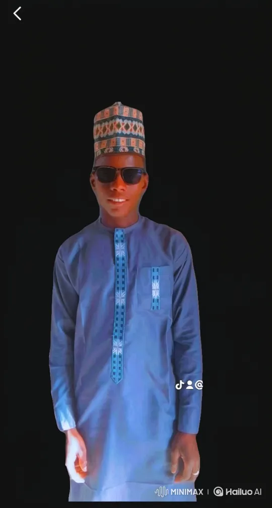 Young Man in Blue Tunic Shows Confidence – AI Generated Video | Hailuo AI