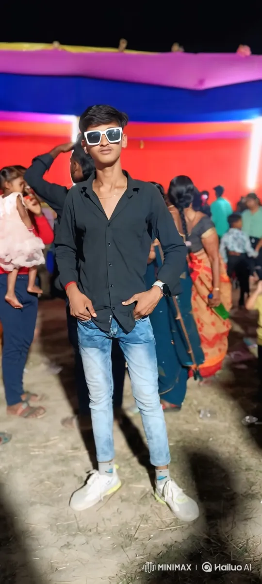 Young Man in Stylish Attire at Night Gathering – AI Generated Video | Hailuo AI