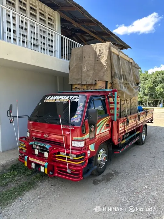 Custom Red Truck Lowers Its Suspension on Gravel Road – AI Generated Video | Hailuo AI