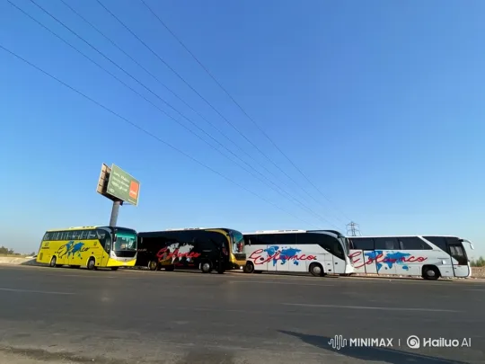 Tour Buses Parked with a Sunny, Still Atmosphere – AI Generated Video | Hailuo AI